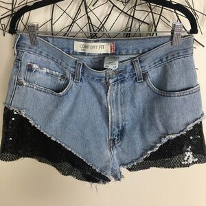 Sequin Levi cutoff shorts. Upcycled jeans